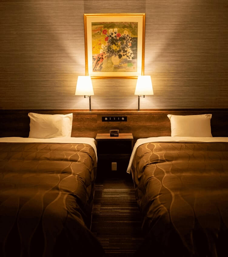 ホテル部屋ベッド画像